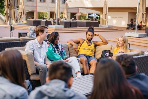 Group of students sitting outside